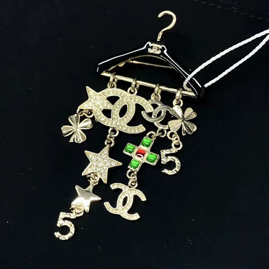 Chanel 23c rhinestone and glass pendant brooch