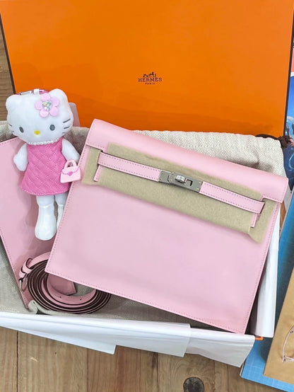 Hermès Kelly Danse bag in cherry pink, silver trim, Swift leather, K engraving, new.
