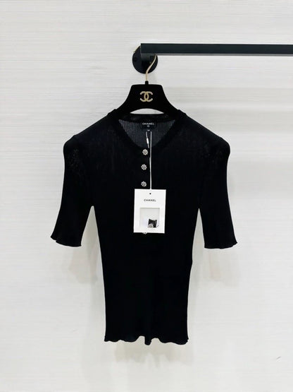 Chanel 26A Black Knit Top with Rhinestone Flower Button, Short Sleeve, F34