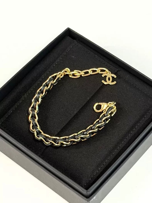 Chanel 26P chain black and gold bracelet
