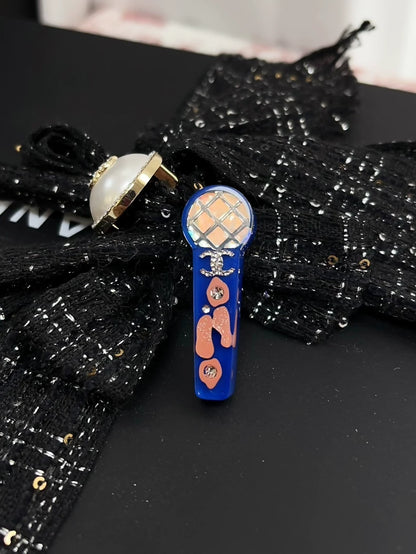 Chanel 22P blue microphone acrylic brooch