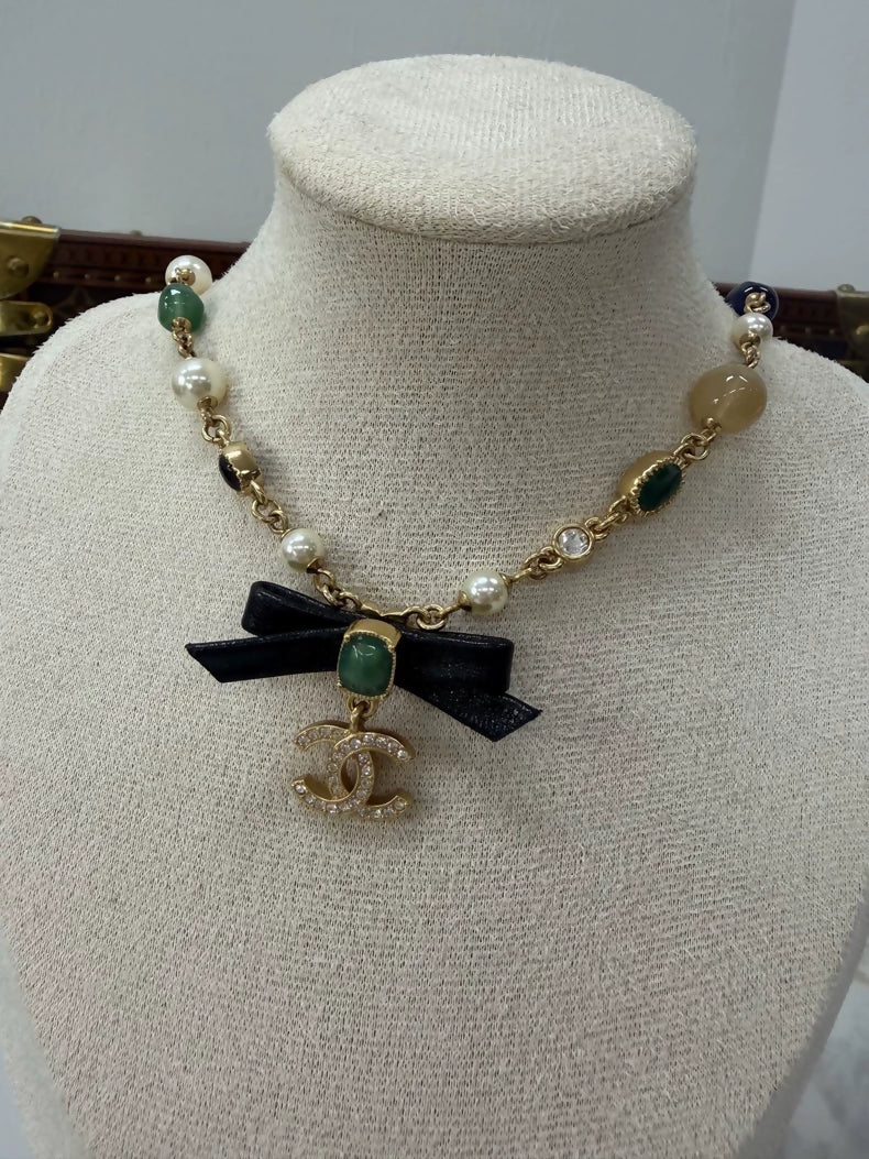 Chanel Pearl Leather Bow Necklace