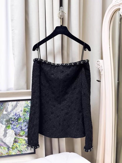Chanel 21A black embossed camellia off-the-shoulder tweed jacket