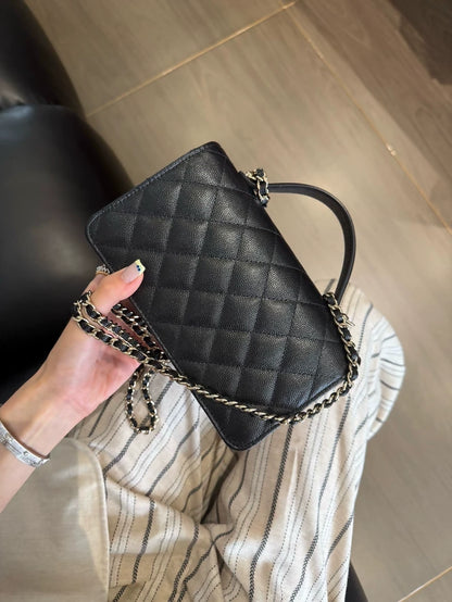 The Chanel 25C black and gold bag