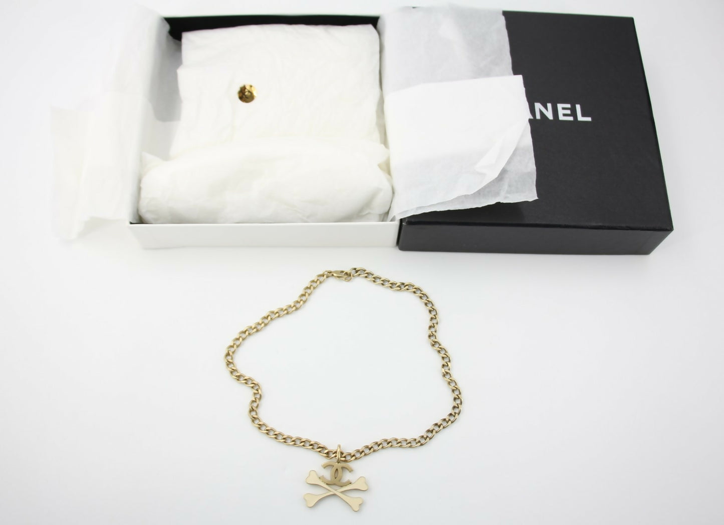 Chanel Vintage 03P Gold-plated CC Enamel White Skull Necklace