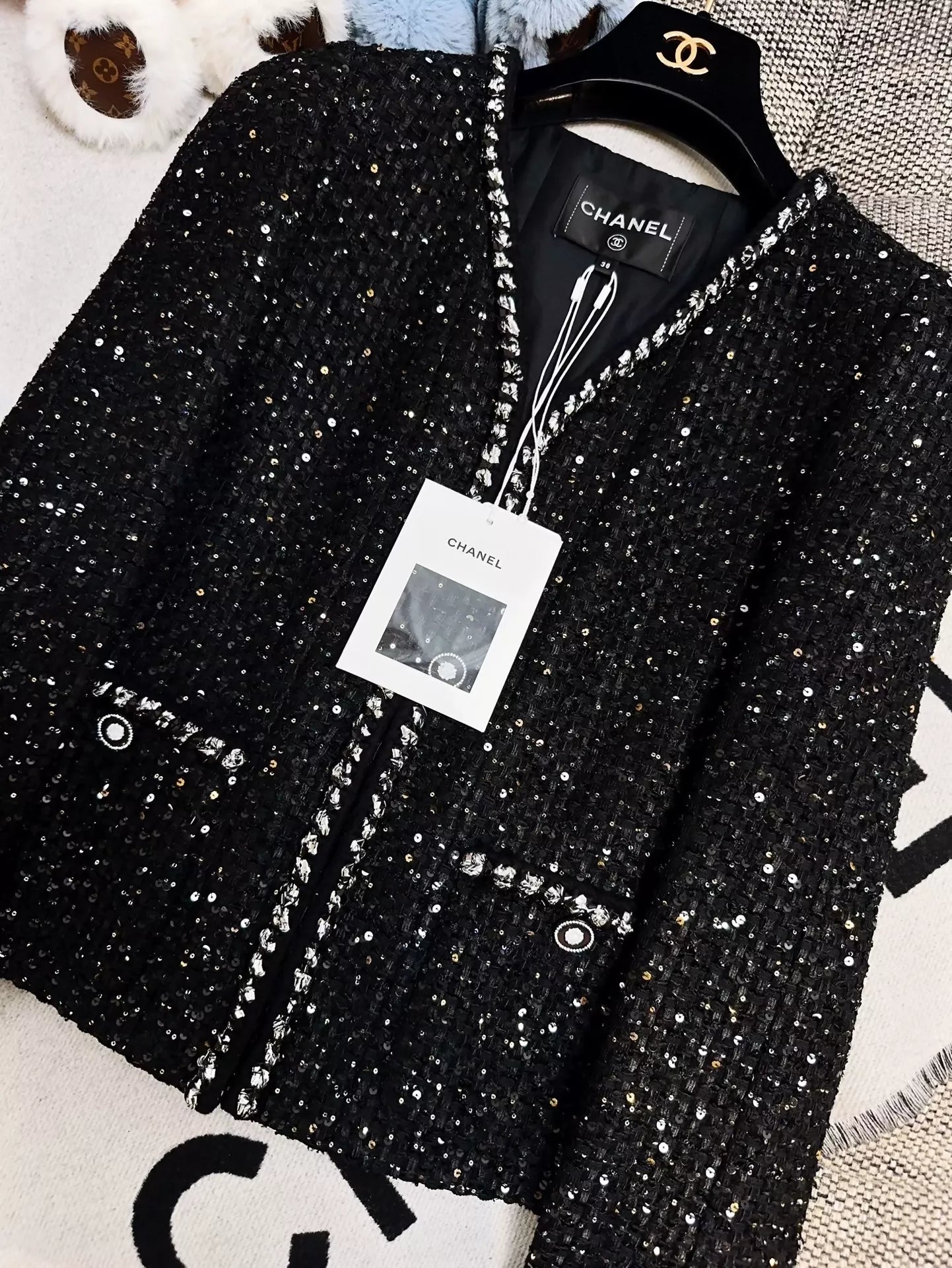 Chanel 22p black sequins tweed jacket