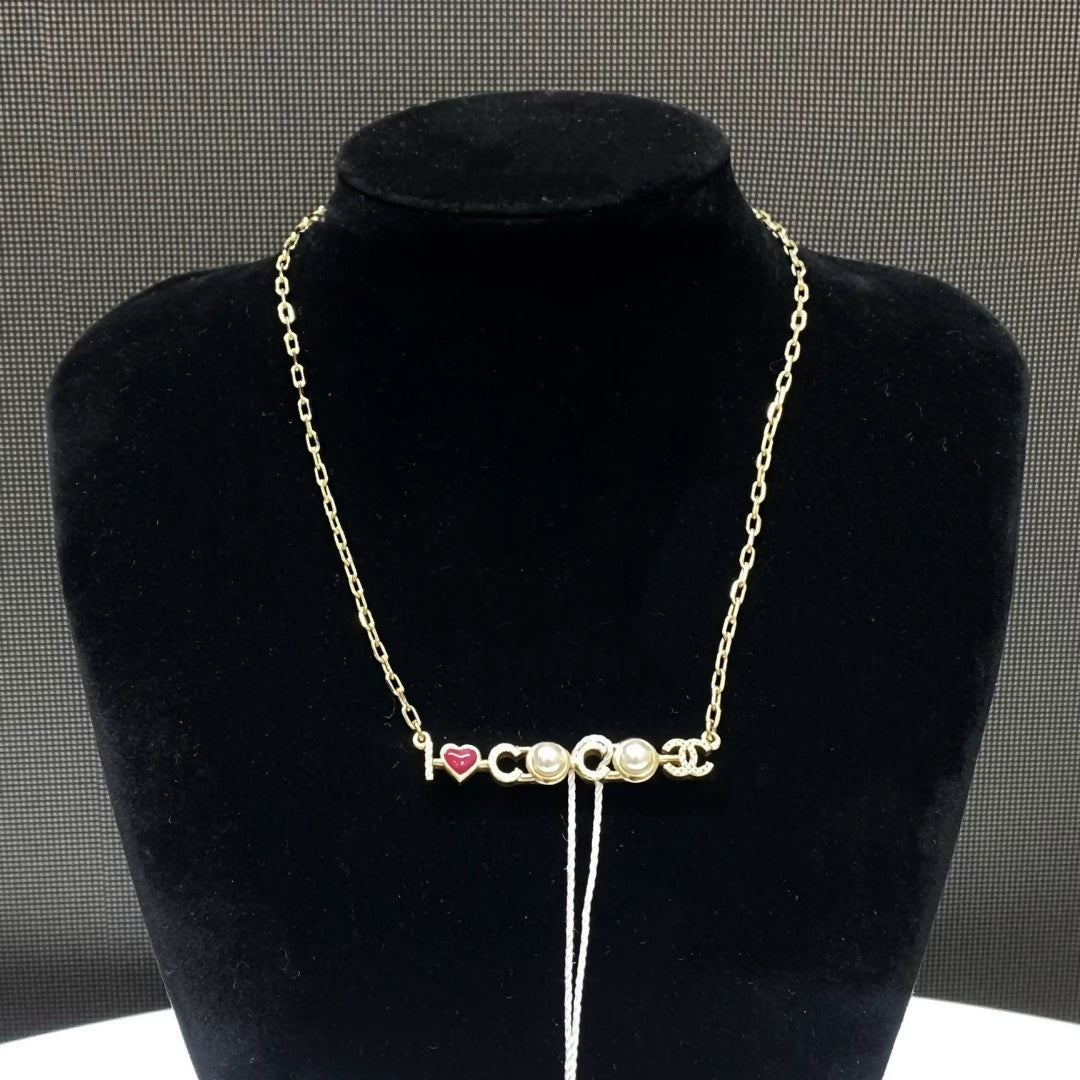 Chanel 17P gold letter pearl necklace
