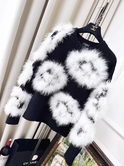 Chanel 23K white ostrich feather black camellia sweater