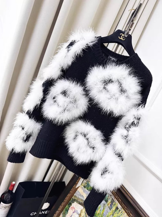 Chanel 23K white ostrich feather black camellia sweater