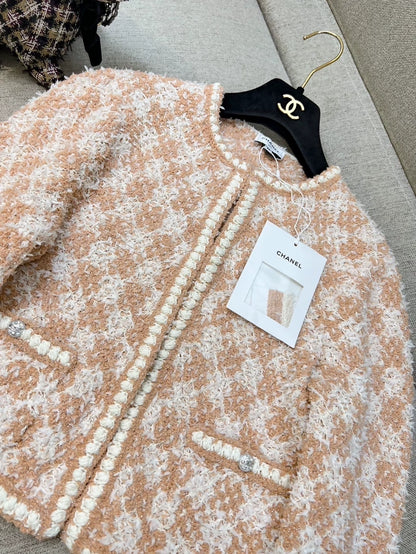 Chanel 23s orange tweed cardigan