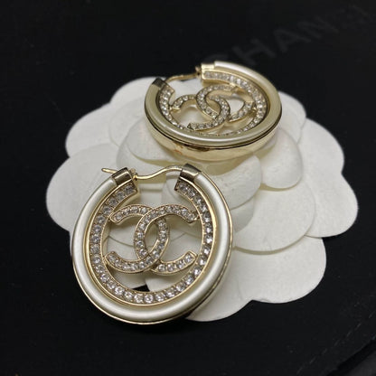 Chanel 21B round rhinestone double C earrings