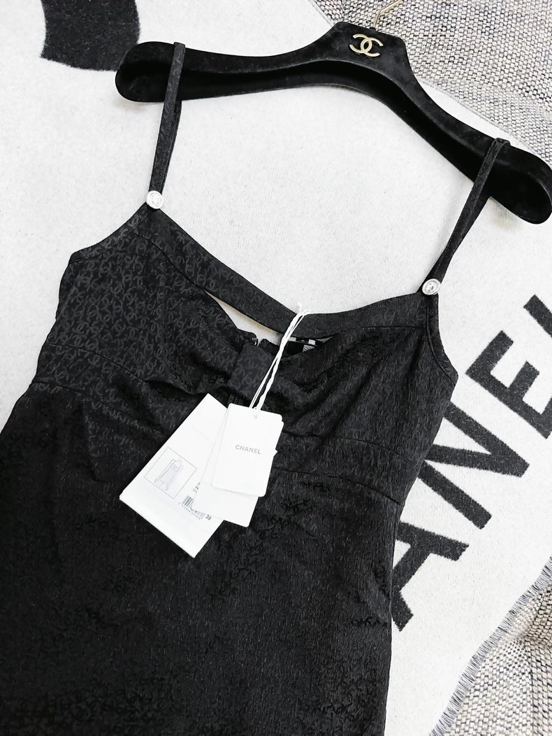 Chanel 21k gold little black dress