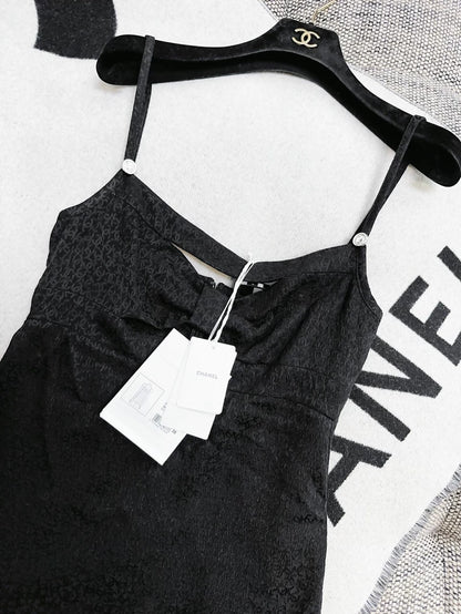 Chanel 21k gold little black dress