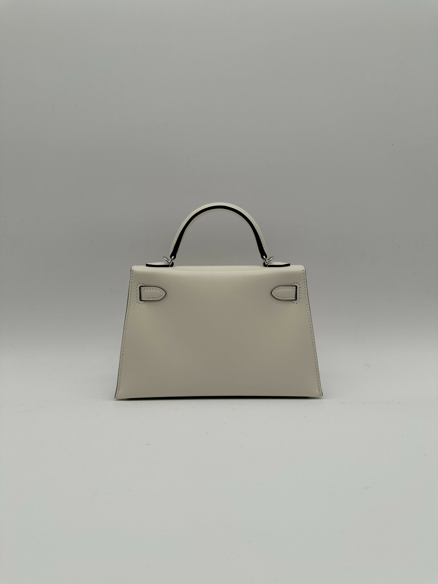 Hermès Kelly 20 Clouté Cream PHW G 2026