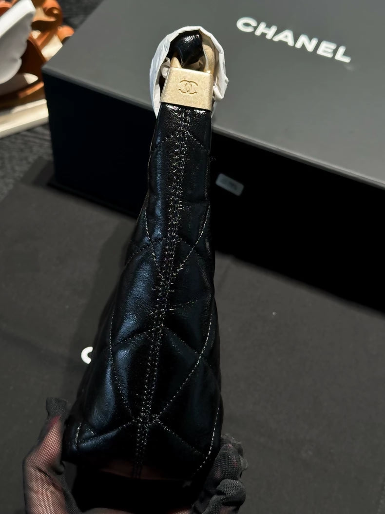 Chanel 24A black and gold waxed leather, small size cross body bag