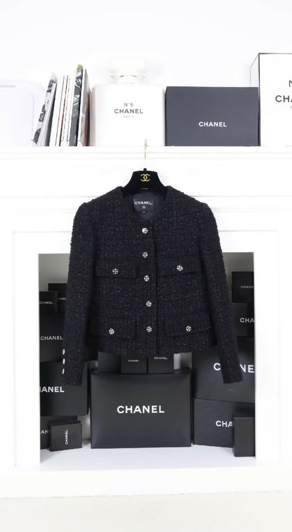 Chanel 21K black tweed diamond-button four-pocket jacket