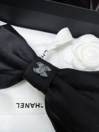 Chanel 25k black bow hairpin