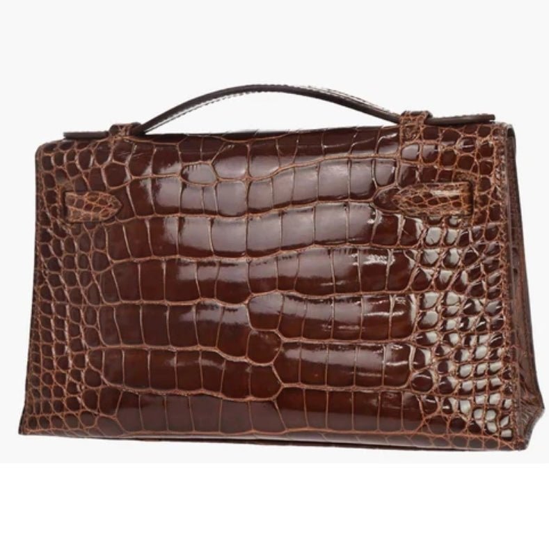 Hermes kelly pochette miel shiny alligator leather gold hardware