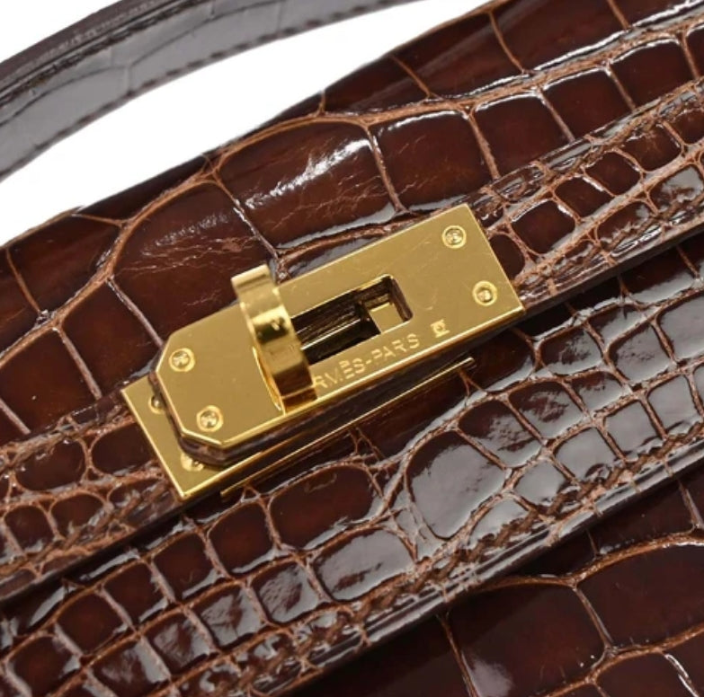 Hermes kelly pochette miel shiny alligator leather gold hardware