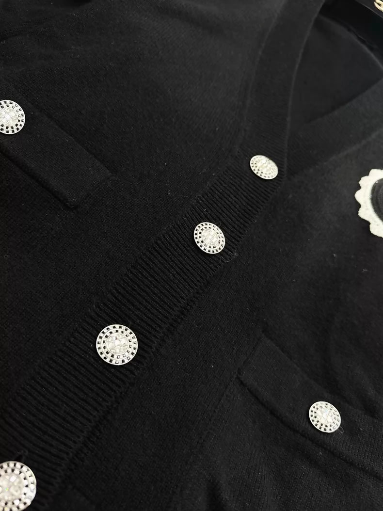 Chanel 23C Black Knit Cardigan with Embroidered Number 5 Badge