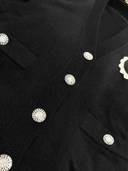 Chanel 23C Black Knit Cardigan with Embroidered Number 5 Badge