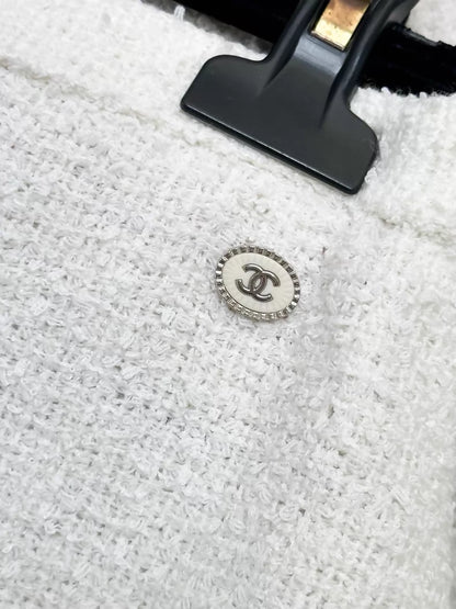 Chanel 16A black and white tweed mini skirt