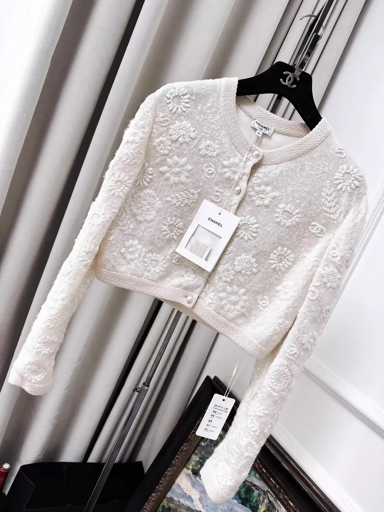 Chanel 21S  off-white knit cardigan with heavy embroidery, sequined camellia