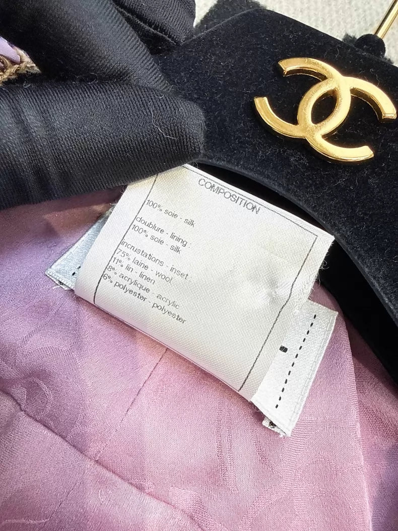 Chanel 15b Pinkish-purple tweed pleated silk dress with bow detail