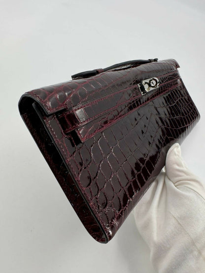 Hermès Kelly Cut Bag in Bordeaux Shiny Porosus Crocodile Leather with PHW