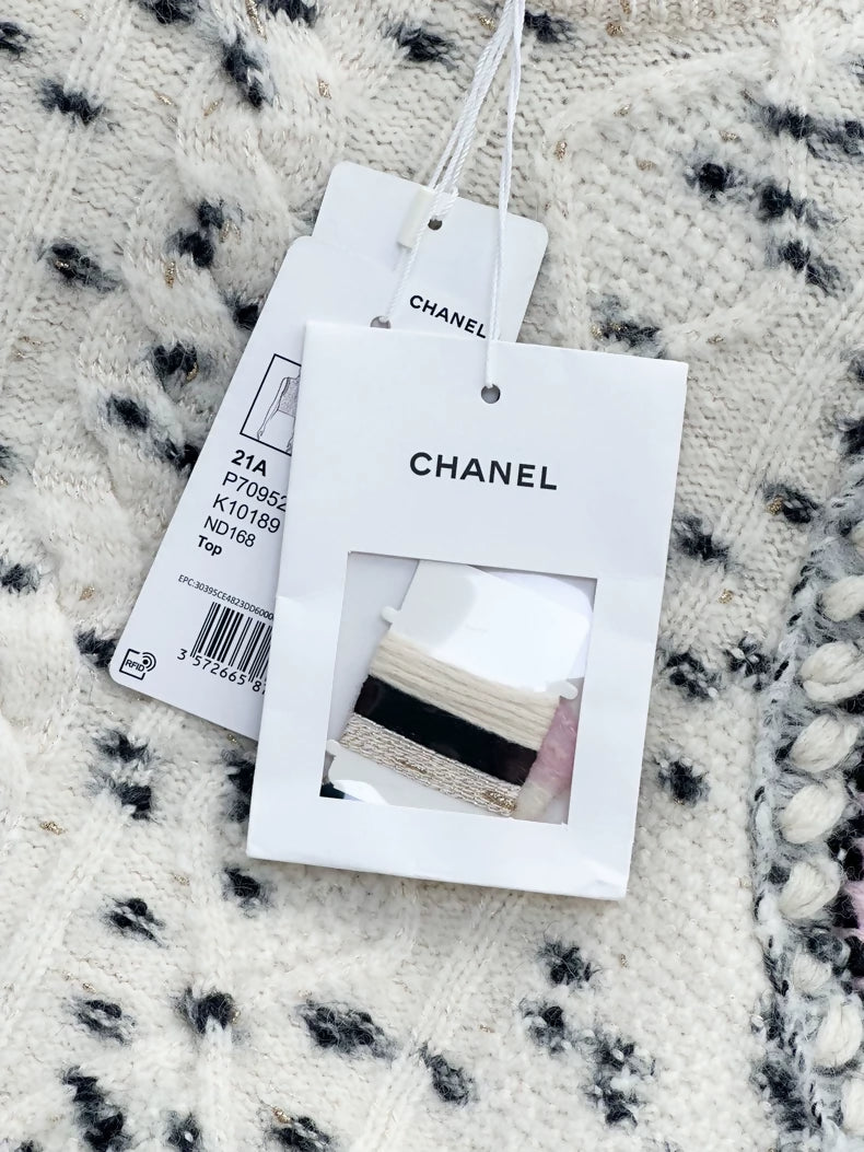Chanel 21A black and white polka dot knit turtleneck sweater