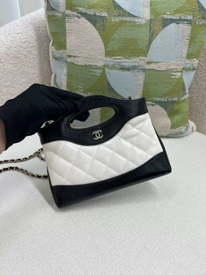 Chanel black and white panda-themed 31 mini nano bag