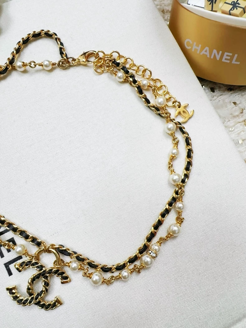 Chanel 24K gold leather chain double C pearl necklace