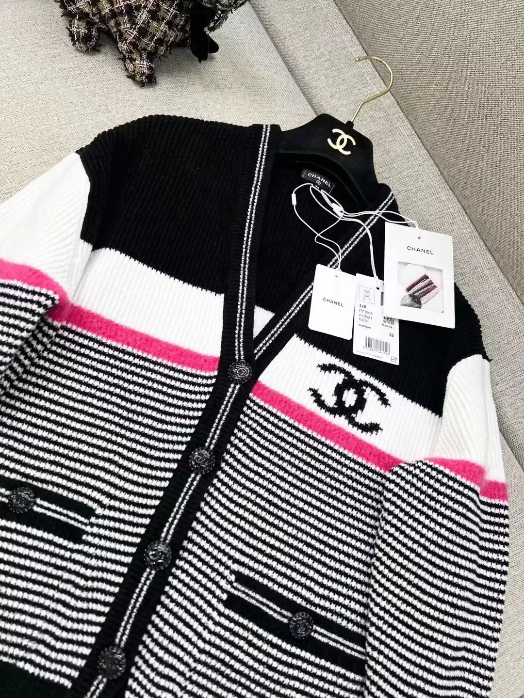 Chanel 22B black and white striped double C knit cardigan