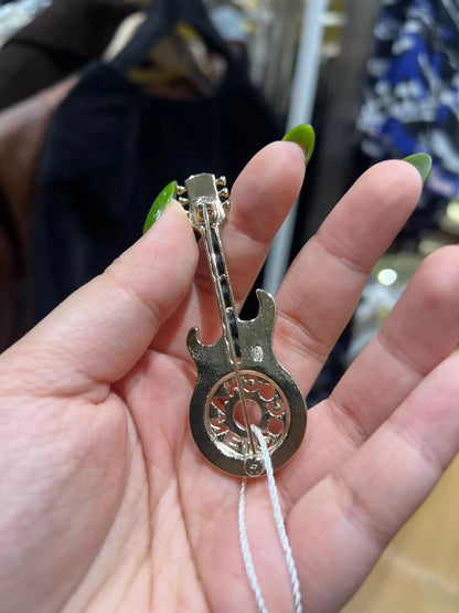 Chanel 24A guitar brooch