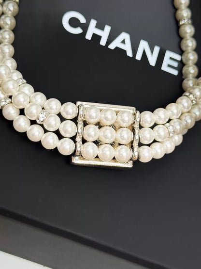 Chanel 24S pearls necklace with square rhinestones and a double-C logo