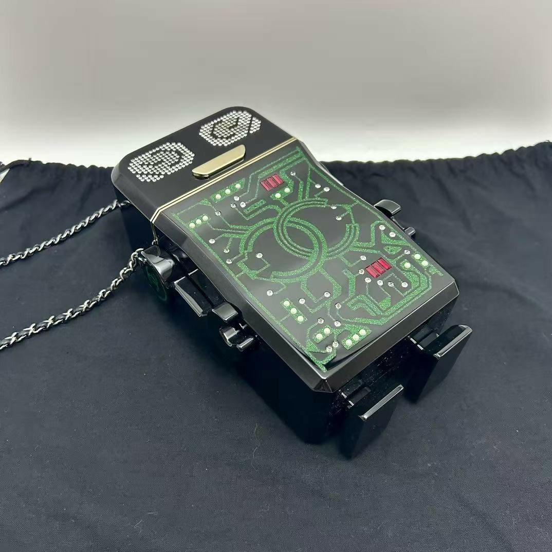 pre-owned chanel limited edition robot minaudière bag black plexiglass and crystals ruthenium hardware