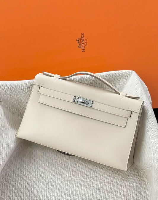 Hermès Kelly pochette Craie/Nata Swift with Palladium Hardware