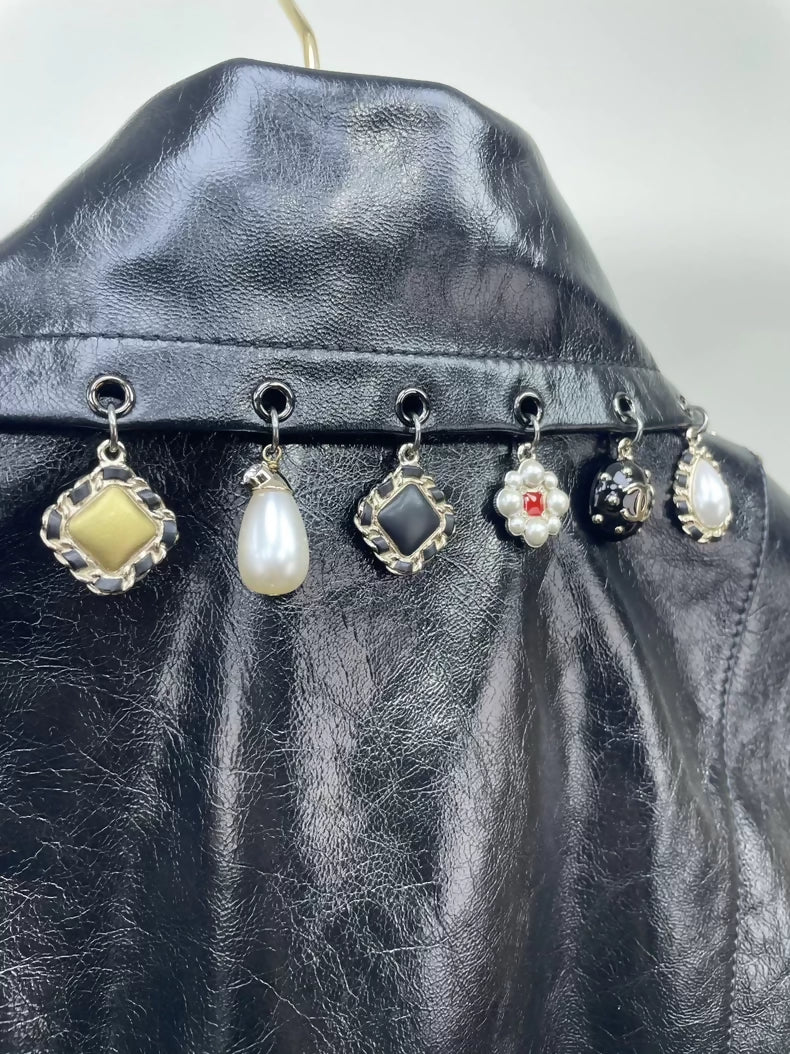 Chanel 24A black leather vest with charms