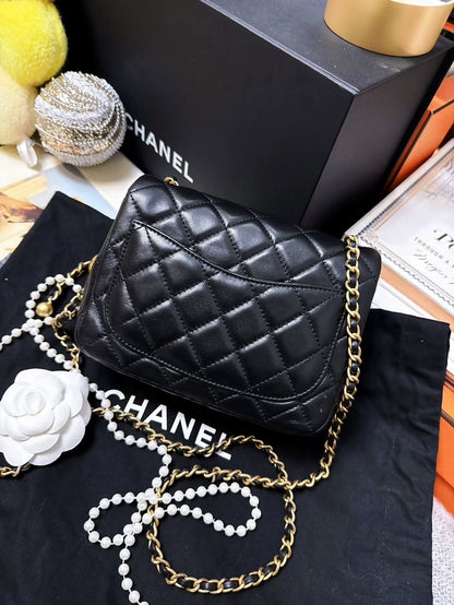 CHANEL 21b classic black and gold ball square bag