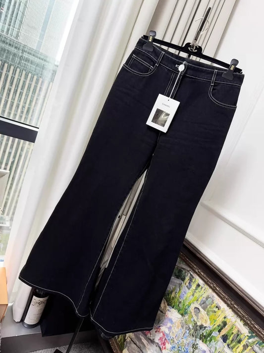 Chanel 23b black flared jeans with white stitching