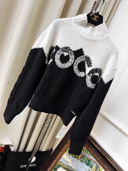 Chanel Coco Neige Ski Collection Black and White Knit Sweater with Coco Logo