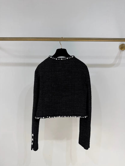 Chanel 25P pearl-trimmed black jacket