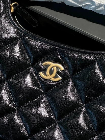Chanel 24A black and gold waxed leather, small size cross body bag