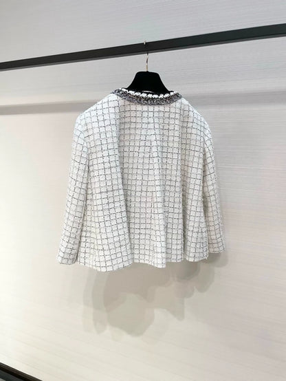 Chanel 25S Black and white checkered tweed cape coat