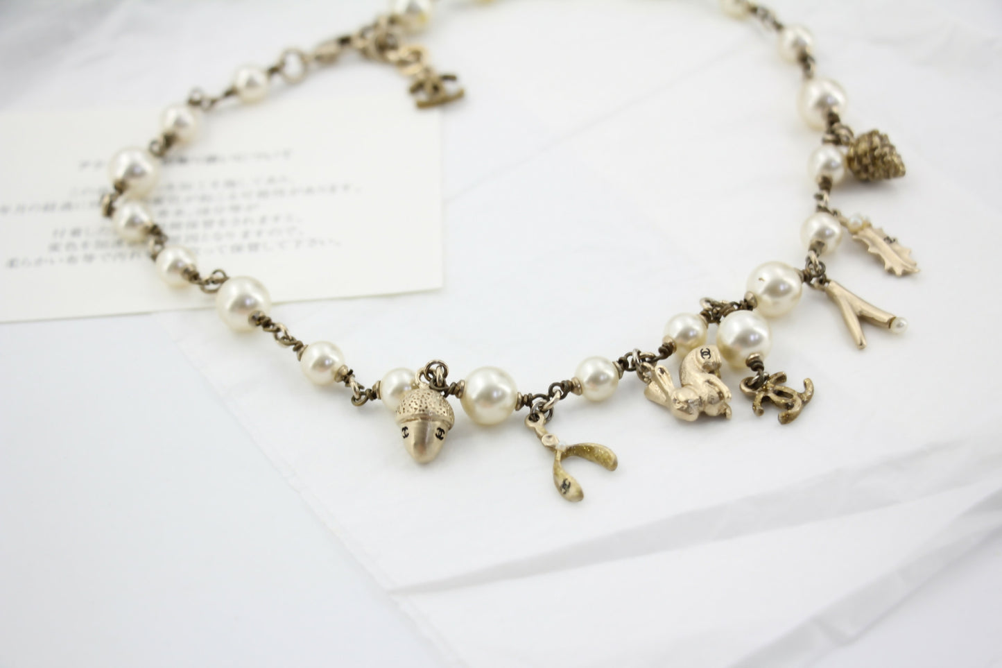 Chanel Vintage 05A Imitation Pearl Metal Rabbit Pendant Gold Necklace