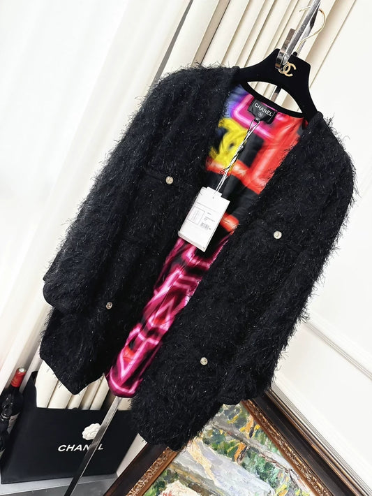 Chanel 21s black shimmering fringed jacket