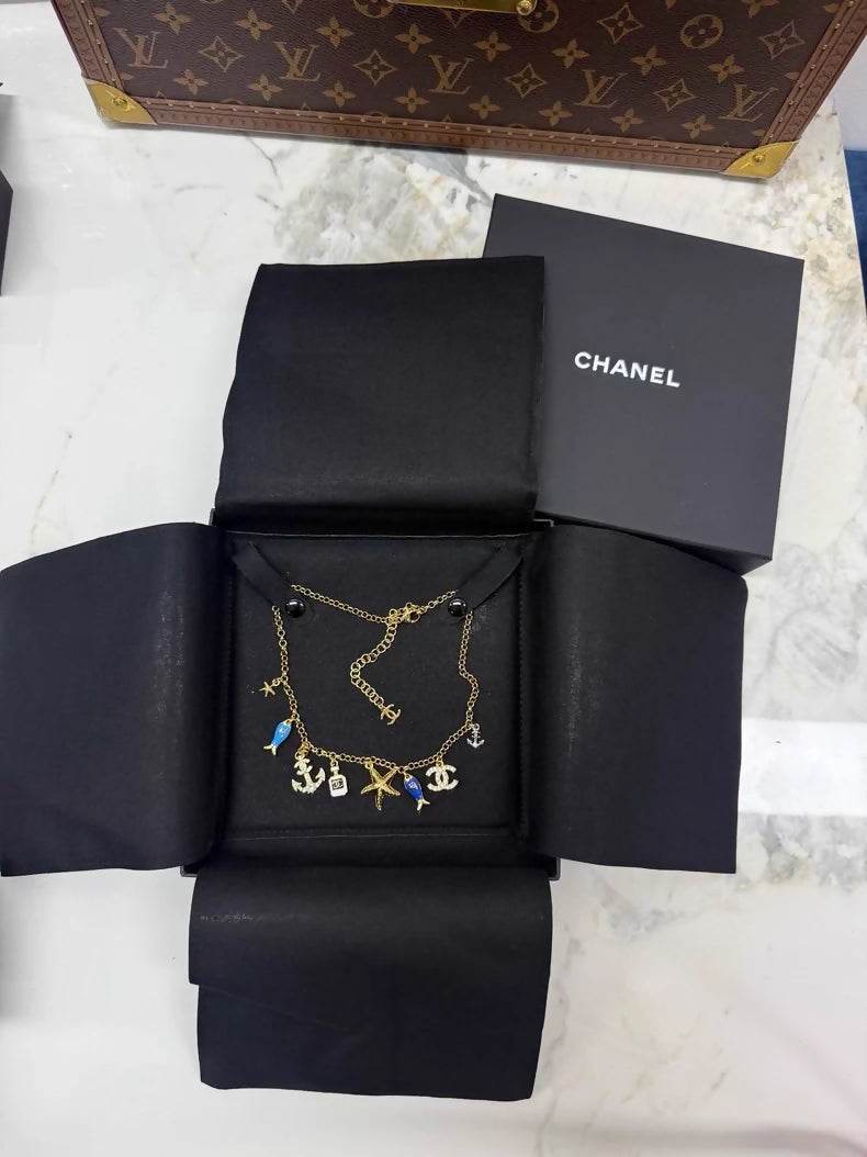 Chanel 25C Ocean Fish and Starfish charm Necklace
