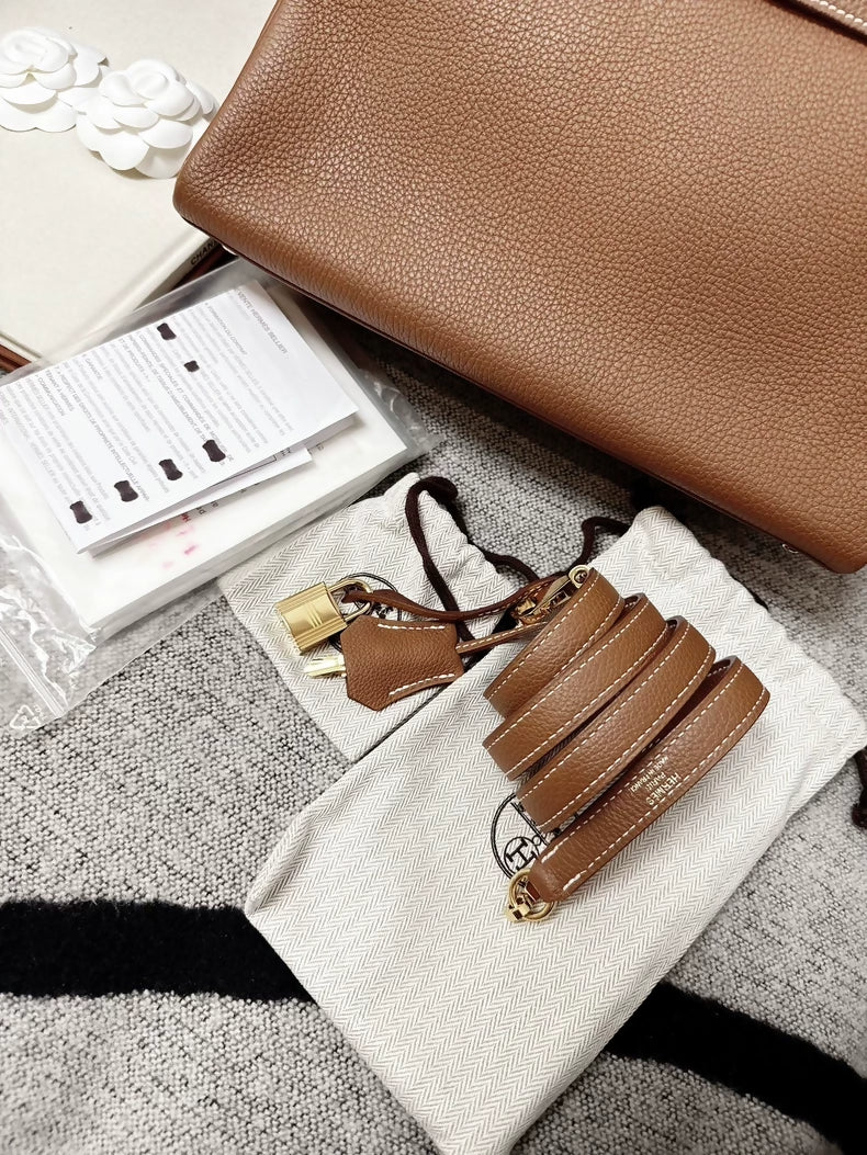 Hermès Kelly 28 golden brown Togo leather gold hardware