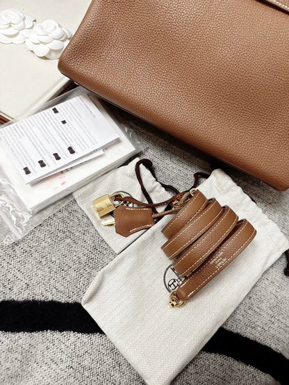 Hermès Kelly 28 golden brown Togo leather gold hardware