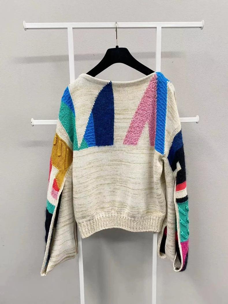 Chanel 19A geometric pattern beige blue pink and black sweater